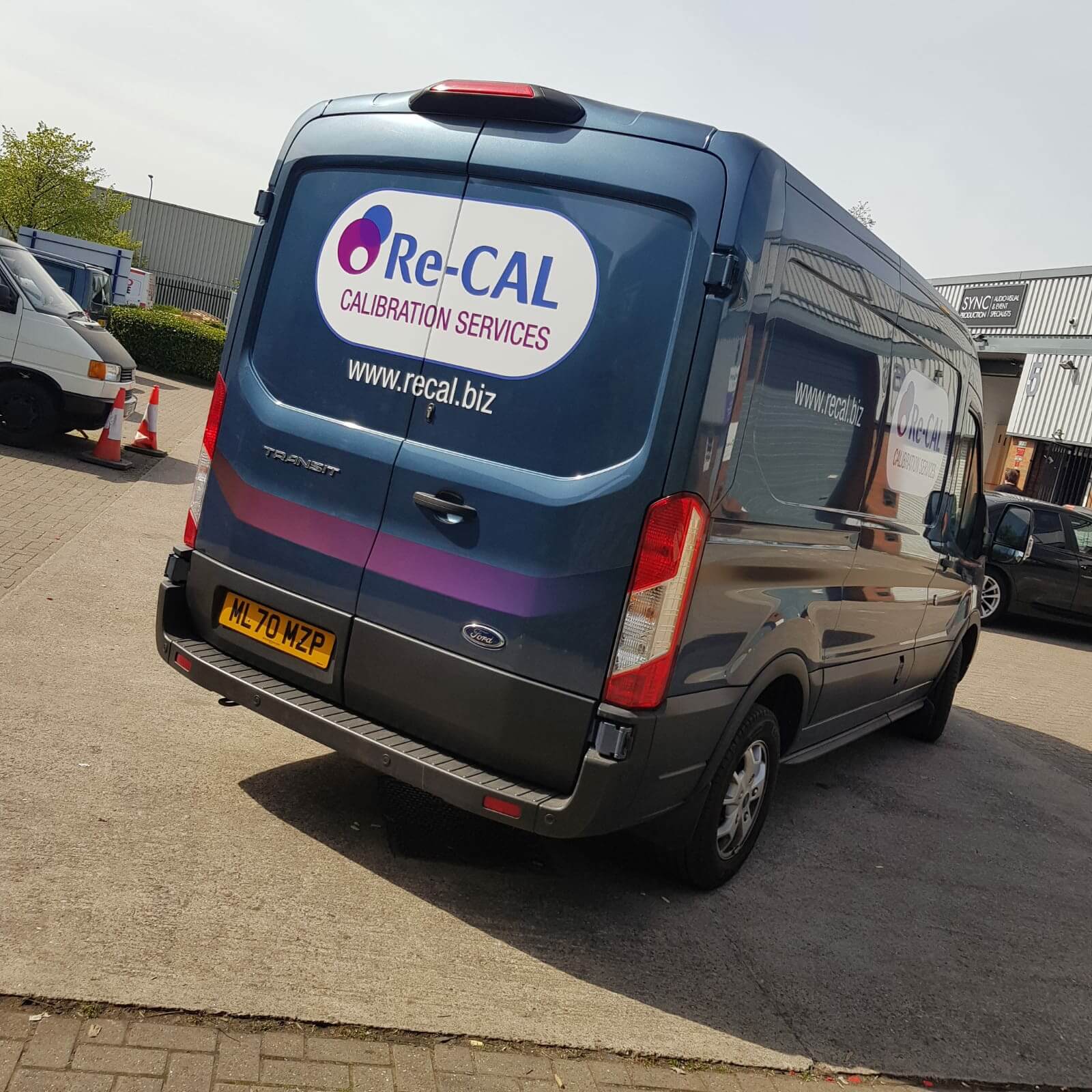Ford Transit with signage to the rear